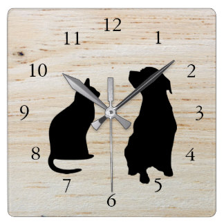 A cat silhouette on a clock face